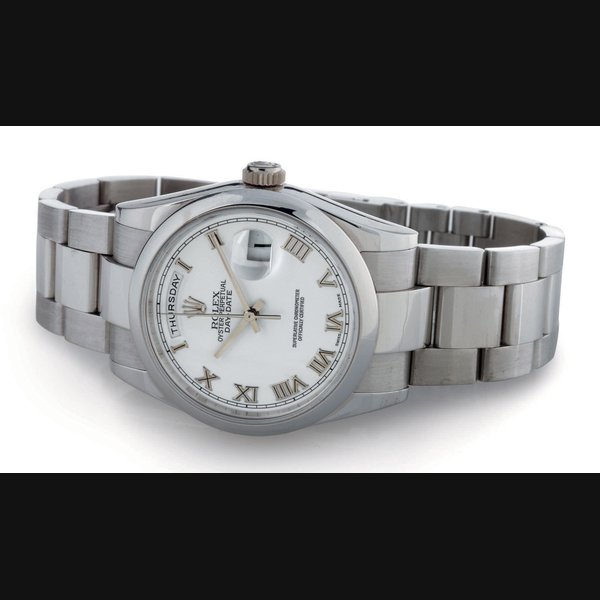 ROLEX. AN 18K WHITE GOLD AUTOMATIC WRISTWATCH WITH DATE, DAY AND CENTER SECONDS AND BRACELET SIGNED ROLEX, OYSTER PERPETUAL, DAY-DATE, CASE NO. K983462, REF. 118209, CIRCA 2001