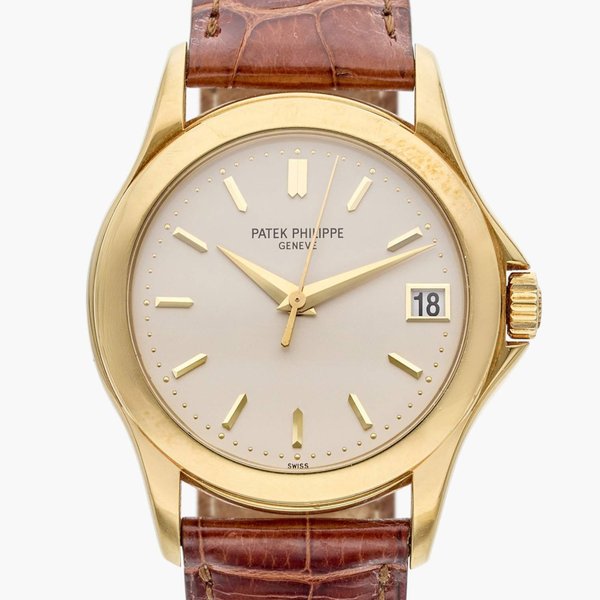 Patek Philippe Reference 5107J-001 Calatrava | A yellow gold automatic wristwatch with date, Circa 2000