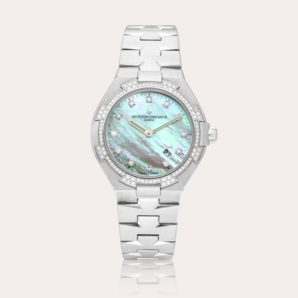 Vacheron Constantin Overseas, Reference 25750 | A stainless steel and diamond-set wristwatch with date, bracelet and mother-of-pearl dial, Circa 2005 | 江詩丹頓 | Overseas 型號25750 | 精鋼鑲鑽石鏈帶腕錶，備日期及珠貝母錶盤，約2005年製 · 25750
