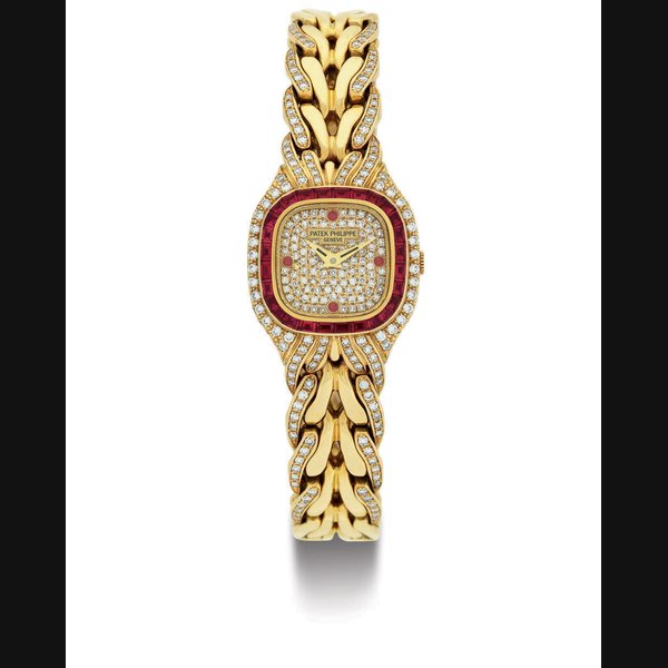 PATEK PHILIPPE. A LADY'S FINE 18K GOLD, DIAMOND AND RUBY BRACELET WATCH SIGNED PATEK PHILIPPE, GENEVE, MOVEMENT NO. 1650662, CASE NO. 2896691, REF. 4806/11, MANUFACTURED IN 1991