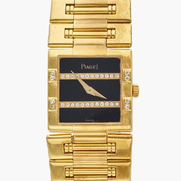 Piaget Reference 81327 K 81 Dancer | A yellow gold and diamond-set bracelet watch with onyx dial, Circa 1980