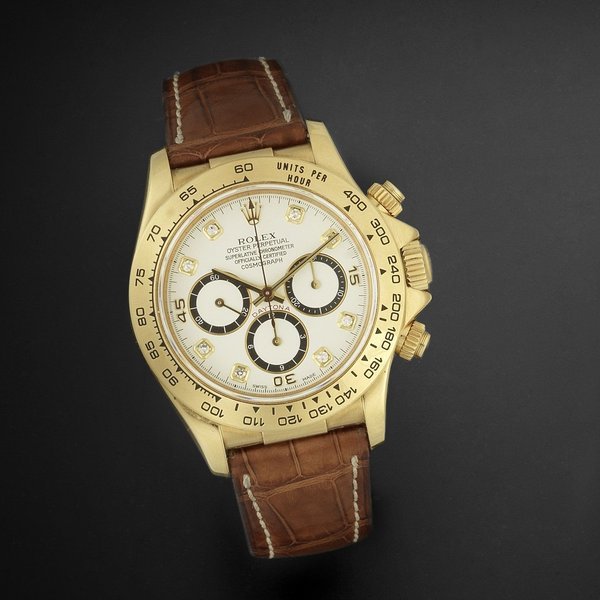Rolex Rolex. An 18ct gold and diamond set automatic chronograph wristwatch Cosmograph Daytona, Ref:16518, Serial No.N26****, Movement No.515**, Circa 1993 · 16518