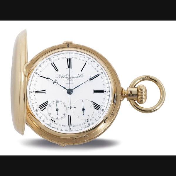 GRANDJEAN. A FINE HEAVY 18K GOLD TWO-TRAIN HUNTER CASE KEYLESS LEVER WATCH WITH INDEPENDENT SECONDS AND JUMP FIFTH SECONDS SIGNED H. GRANDJEAN & CO., LOCLE, NO. 34881, CIRCA 1890