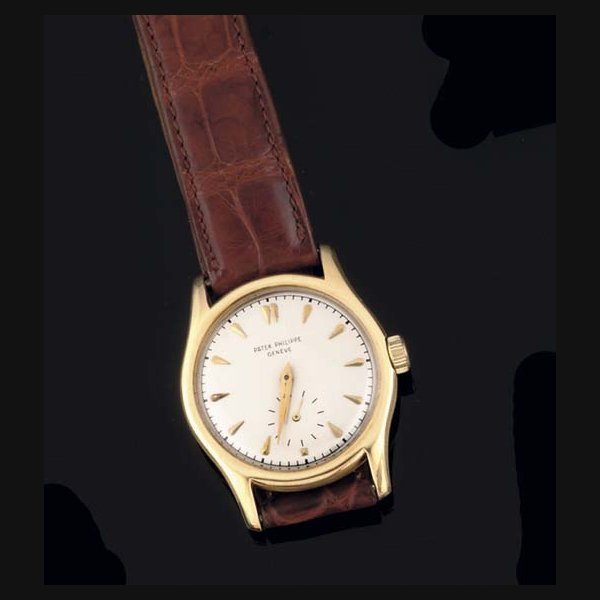Patek Philippe Patek Philippe.An 18ct Gold Circular Cased Wristwatch SIGNED PATEK PHILIPPE GENEVE, MOVEMENT NO 956646, CASE NO 666369, REF. 2464, MANUFACTURED IN 1951 · 2464