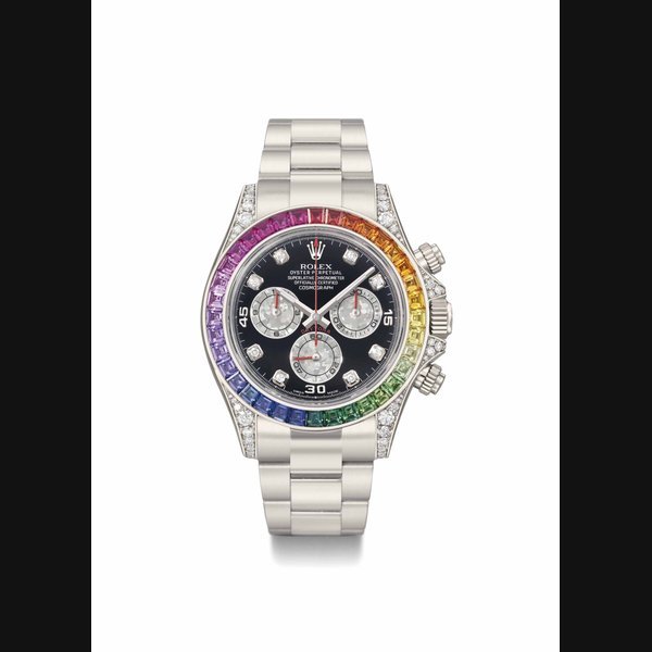 Rolex Rolex. A very rare and impressive 18K white gold and diamond automatic wristwatch with date, rainbow-coloured multi-gem set bezel, diamond-set lugs and protective crown guards, date, original guarantee and box SIGNED ROLEX, OYSTER PERPETUAL, SUPERLATIVE CHRONOMETER OFFICIALLY CERTIFIED, COSMOGRAPH, DAYTONA, REF. 116599RBOW, CASE NO. 360Z0653, MANUFACTURED IN 2012