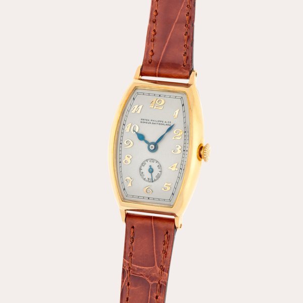 Patek Philippe A yellow gold tonneau shaped wristwatch with Breguet numerals dial | Made in 1929