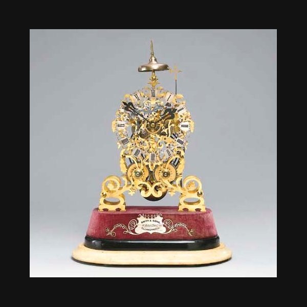 A fine Victorian brass and white marble striking skeleton clock SMITH & SONS, LONDON. CIRCA 1860