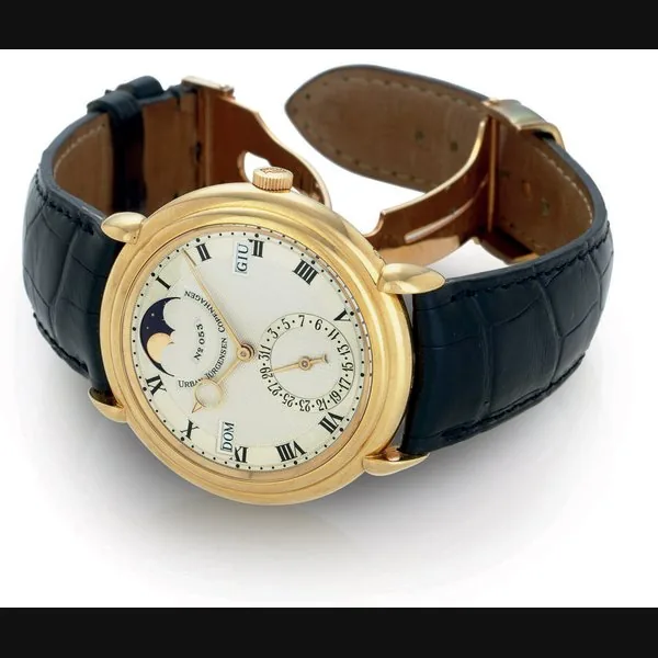 URBAN JÜRGENSEN. AN 18K GOLD AUTOMATIC PERPETUAL CALENDAR WRISTWATCH WITH MOON PHASES SIGNED URBAN JÜRGENSEN, COPENHAGEN, NO. 053, REFERENCE 2, CIRCA 1991