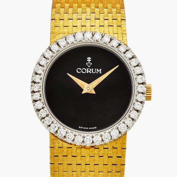 Corum A yellow gold and diamond-set bracelet wristwatch with onyx dial, Circa 1970s