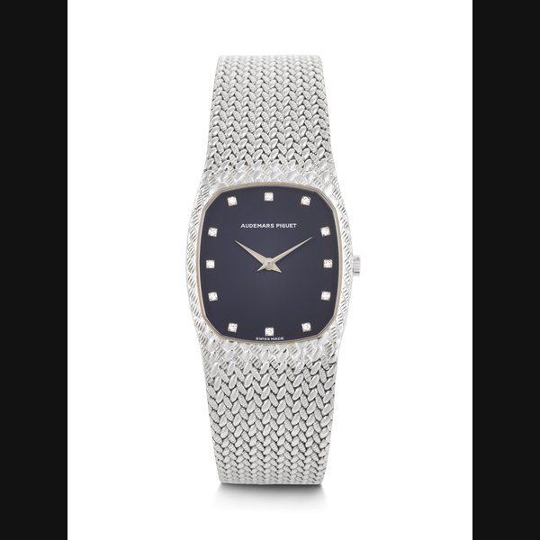 Audemars Piguet AUDEMARS PIGUET. A RARE AND ELEGANT 18K WHITE GOLD BRACELET WATCH WITH DIAMOND-SET DIAL ‘COBRA’ MODEL, REF. 14579BC, MOVEMENT NO. 382'776, CASE NO. D 29863, MANUFACTURED IN 1993, Price & Market Data