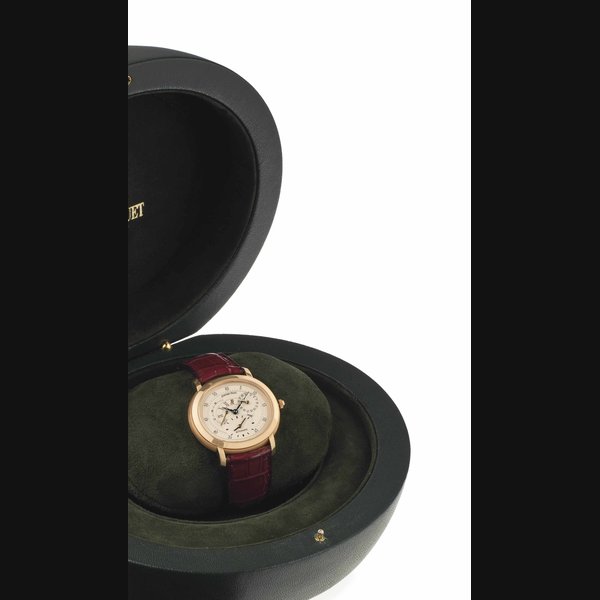 Audemars Piguet. A Fine 18k Pink Gold Oval-Shaped Automatic Dual-Time Wristwatch with Date and Power Reserve SIGNED AUDEMARS PIGUET, MILLENARY MODEL, REFERENCE OR25778/002, MOVEMENT NO. 451'157, CASE NO. D85208, CIRCA 2000