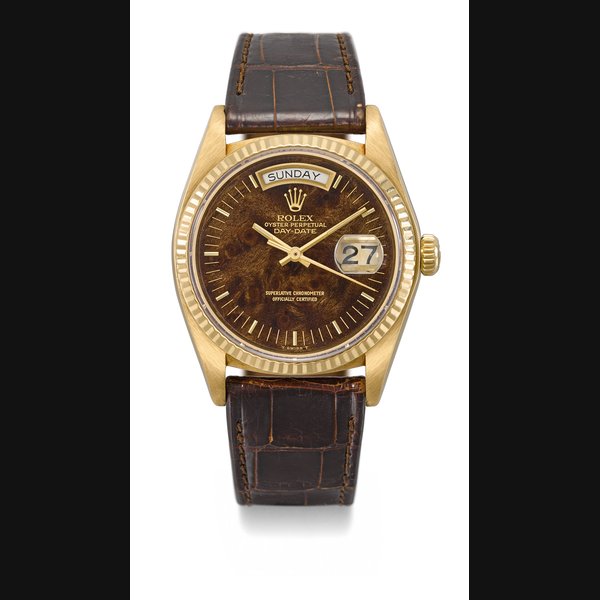 ROLEX. A VERY FINE AND RARE 18K GOLD AUTOMATIC WRISTWATCH WITH SWEEP CENTRE SECONDS, DAY, DATE AND WOODEN DIAL SIGNED ROLEX, OYSTER PERPETUAL, DAY-DATE, REF. 18038, CASE NO 6’195’186, CIRCA 1979