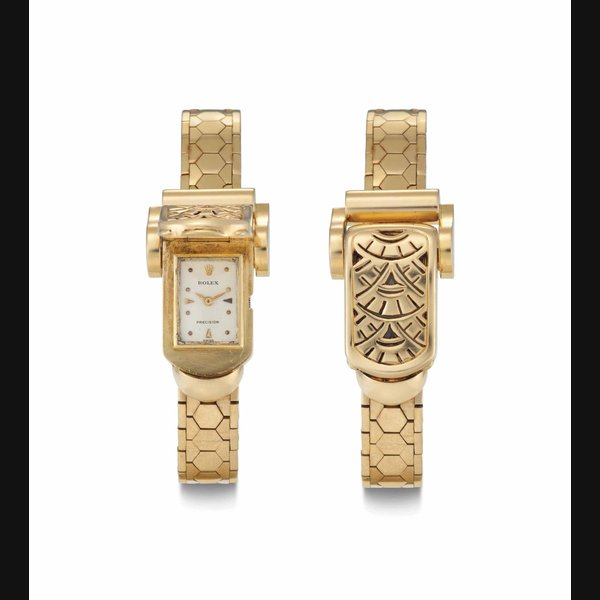 Rolex. A Lady's 18k Gold Bracelet Watch with Concealed Dial SIGNED ROLEX, PRECISION, CIRCA 1960