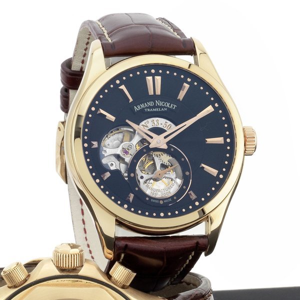 Armand Nicolet. An 18K rose gold manual wind wristwatch Ref:AN7130A, No.33/50, Case No.35964, Sold 20th July 2007