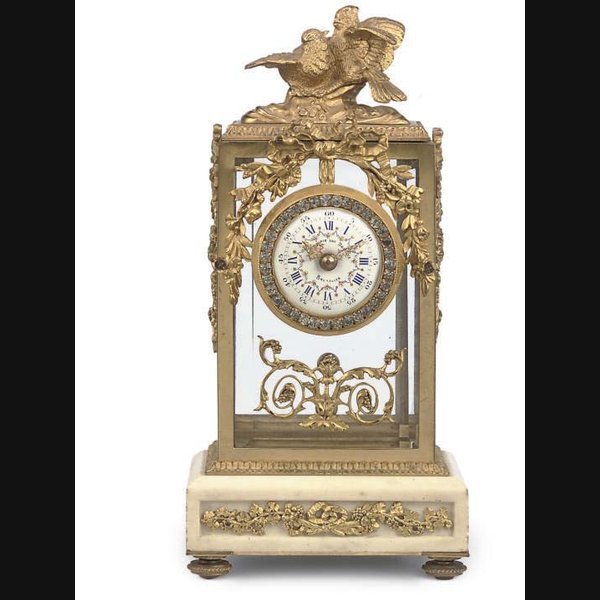 A French white marble and ormalu eight day timepiece four-glass mantel clock RETAILED BY COMPAGNIE DES BRONZES, BRUSSELS. CIRCA 1890