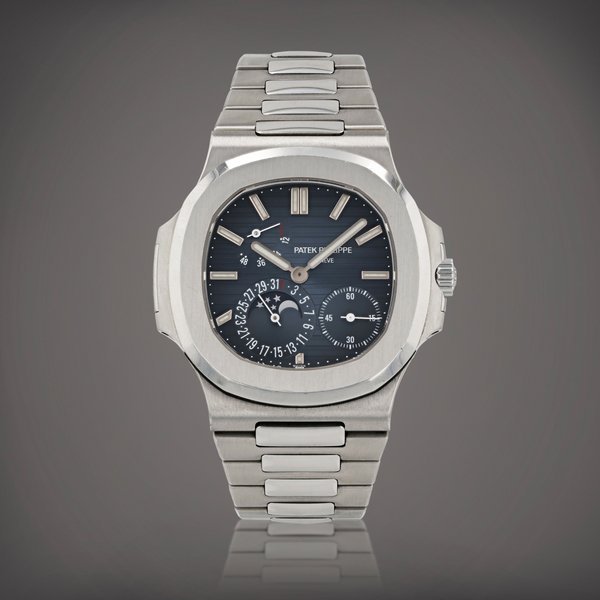 Patek Philippe Nautilus, reference 5712/1A-001 Montre bracelet en acier avec date, phases de lune et indication de la réserve de marche | Stainless steel wristwatch with date, moon phases, power reserve indication and bracelet Vers 2015 | Circa 2015 · 5712/1A-001