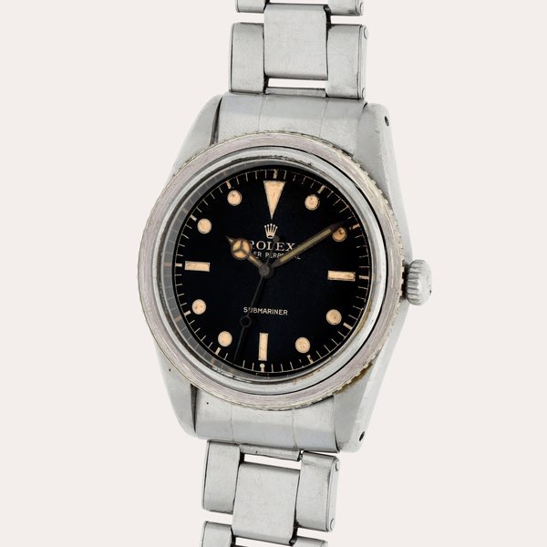 Rolex Submariner, Reference 6205 | A stainless steel wristwatch with bracelet | Circa 1954 · 6205