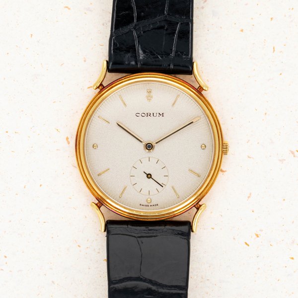Corum Corum 94.152.56 18k YG Quartz · 94.152.56