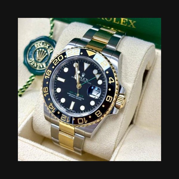 Rolex Rolex GMT-Master II116713LN 40MM Black Dial Gold and Steel + Rolex Box