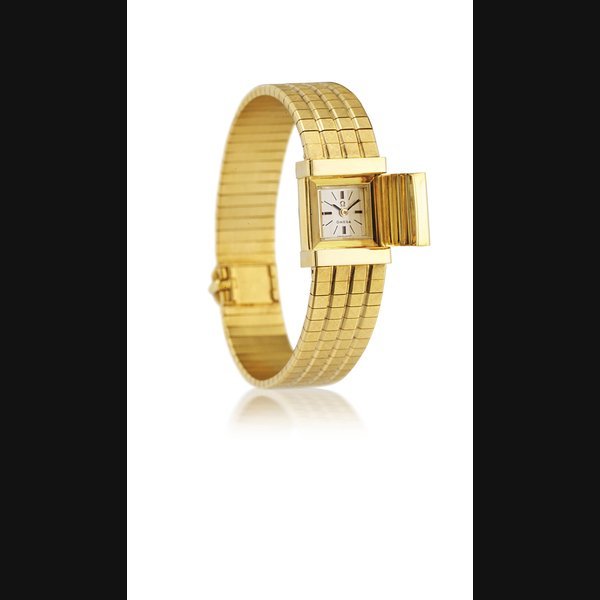  OMEGA YELLOW GOLD MANUALLY-WOUND BRACELET WATCH WITH CONCEALED DIAL MOVEMENT 18085545, CASE 484285, CIRCA 1960