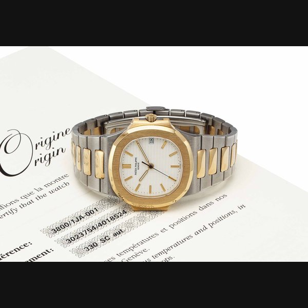Patek Philippe. An 18k Gold and Stainless Steel Automatic Wristwatch with Date and Bracelet SIGNED PATEK PHILIPPE, GENEVE, NAUTILIUS MODEL, REF. 3800/1JA-001, MOVEMENT NO. 3'023'754, CASE NO. 4'018'524, MANUFACTURED IN 1997