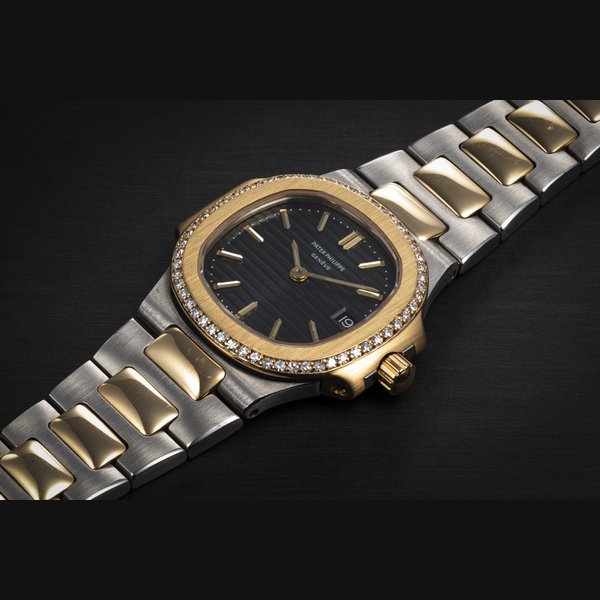 PATEK PHILIPPE, NAUTILUS REF: 4700/2, A LADIES STEEL, GOLD AND DIAMOND WRISTWATCH CASE NUMBER: 558’167