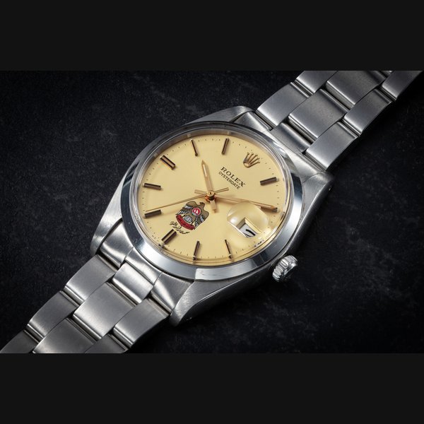 ROLEX, OYSTERDATE, REF. 6694, A STAINLESS STEEL WRISTWATCH WITH THE NATIONAL SYMBOL OF THE UAE CASE NUMBER: 5'498'657
