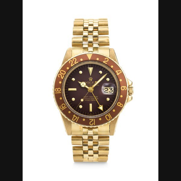 Rolex ROLEX. AN ATTRACTIVE 18K GOLD AUTOMATIC DUAL TIME WRISTWATCH WITH SWEEP CENTRE SECONDS AND DATE SIGNED ROLEX, GMT-MASTER MODEL, REF. 1675⁄8, CASE NO. 2'812'580, CIRCA 1970 · 1675