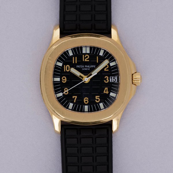 Patek Philippe Patek Philippe Aquanaut 5066J-001 18k YG with Guarantee