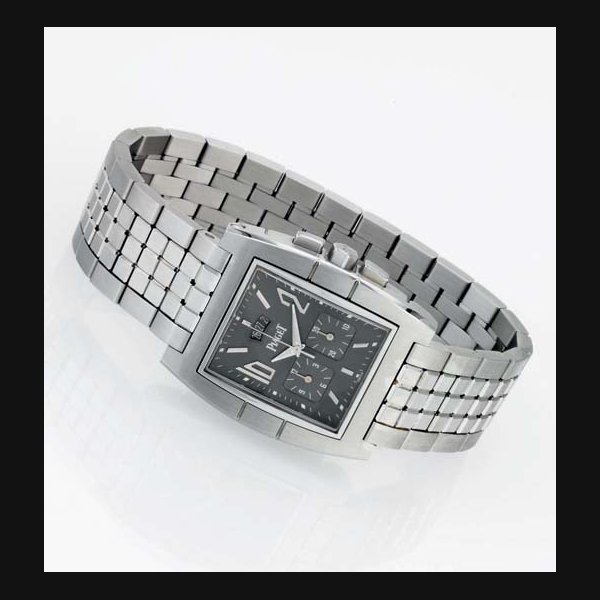 PIAGET. A LARGE STAINLESS STEEL TONNEAU CHRONOGRAPH WRISTWATCH WITH PERPETUAL DATE AND BRACELET SIGNED PIAGET, "UPSTREAM", CASE NO. 861890, REF. 27150, CIRCA 2002