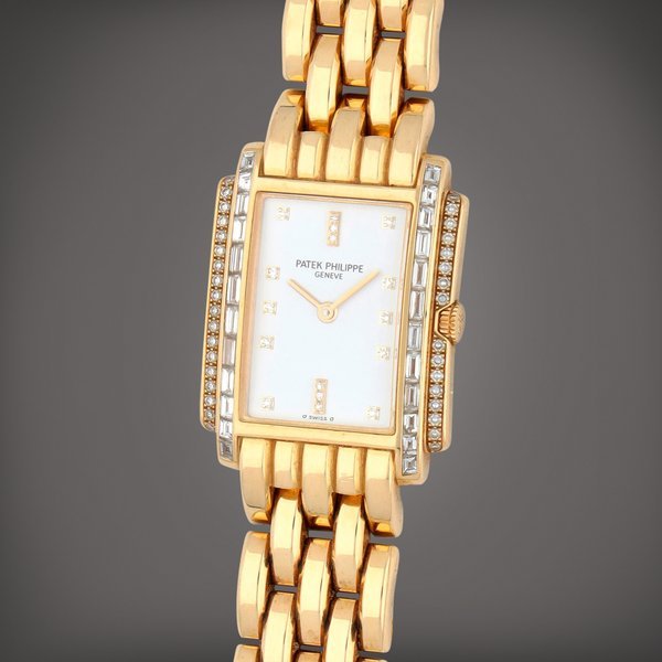 Patek Philippe Reference 4845/1 | A yellow gold and diamond-set bracelet watch | Circa 1997 · 4845/1