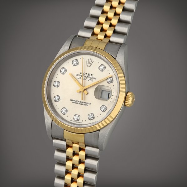 Rolex Datejust, Reference 16233 | A stainless steel and yellow gold wristwatch with date, diamond-set indexes and bracelet | Circa 1997 · 16233