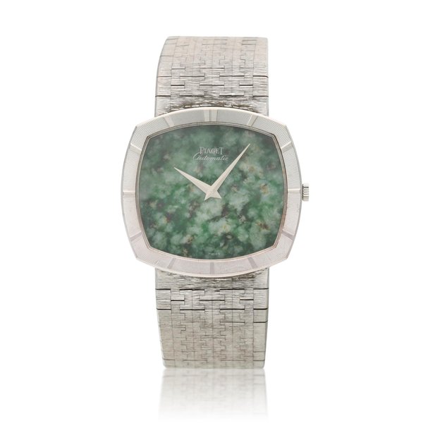 Piaget Reference 12425 A 6, A white gold automatic cushion shaped bracelet watch with jade dial, Circa 1965 · 12425