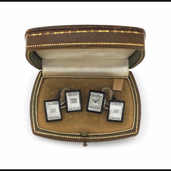 Cartier Cartier. A Fine Pair of Platinum, Diamond-set and Enamel Cufflinks set with a Watch SIGNED CARTIER, MOVEMENT SIGNED LUSINA, CIRCA 1925