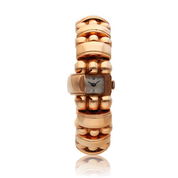 Patek Philippe A pink gold concealed bracelet watch, Circa 1945