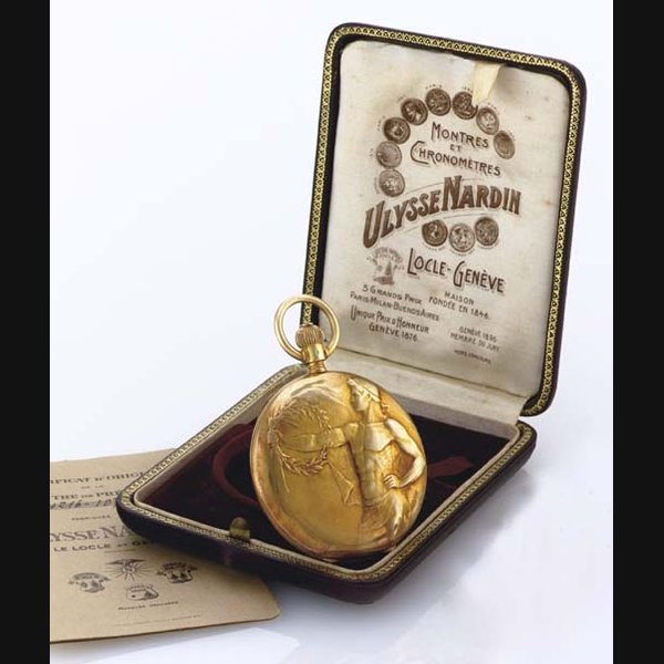 ULYSSE NARDIN. AN 18K GOLD HUNTER CASE KEYLESS LEVER POCKET WATCH WITH SIGNED CHASED CASE, ORIGINAL BOX AND CERTIFICATE SIGNED ULYSSE NARDIN, LOCLE, MOVEMENT NO. 107187, CASE NO. B4216, CIRCA 1920