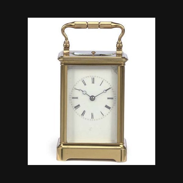 A French brass striking and repeating eight day carriage clock DROCOURT. CIRCA 1870