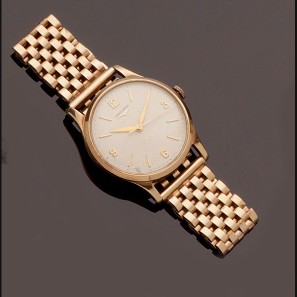 Longines: A gentleman's 9ct gold wristwatch