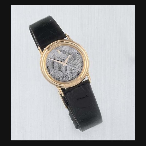 Corum Corum. An 18ct Gold Water Resistant Quartz Wristwatch with Meteorite dial SIGNED CORUM METEORITE, CASE NO 50450.050060, CIRCA 1995