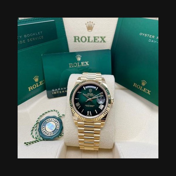 Rolex Rolex Day-DateUNWORN Day-Date 40mm 228238 Yellow Gold Presidential Bracelet Green Ombre Roman Dial Full Set Unworn Complete Box & Papers