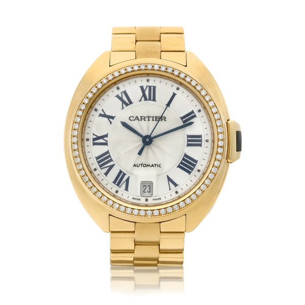 Cartier Reference 3853 Clé de Cartier, A yellow gold and diamond-set automatic wristwatch with date and bracelet, Circa 2010 · 3853