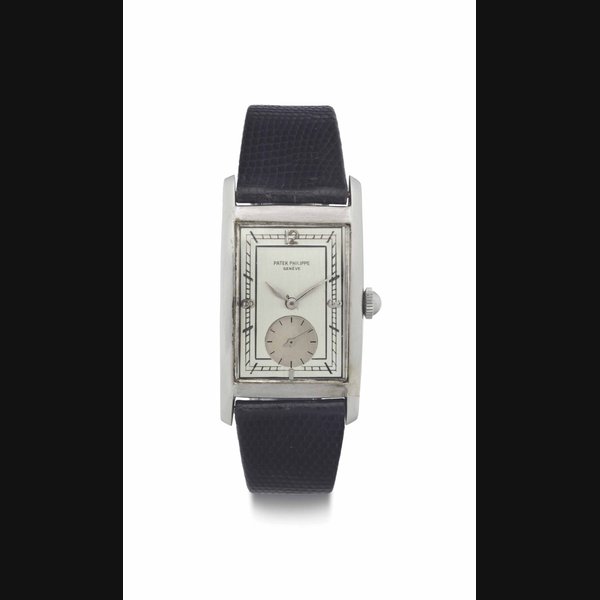 Patek Philippe. A Rare and Early Large Curved Rectangular Staybrite Steel Wristwatch with Original Box SIGNED PATEK PHILIPPE, GENÈVE, REF. 450, MOVEMENT NO. 833'079, CASE NO. 616'831, MANUFACTURED IN 1938