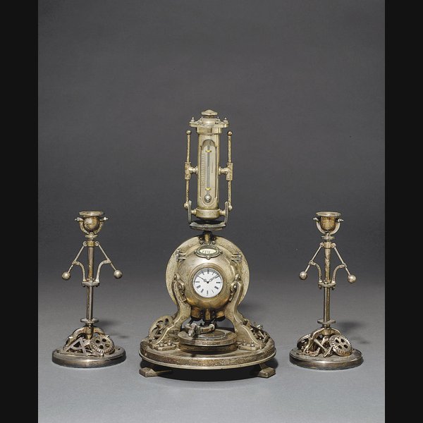  A rare French silver-plated eight day compendium timepiece in the form of a spherical boiler with thermometers and calendar with candlesticks CIRCA 1900