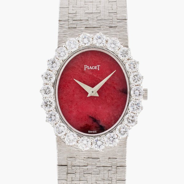 Piaget Reference 9338 A6 | A white gold and diamond-set bracelet watch with red jasper dial, Circa 1975
