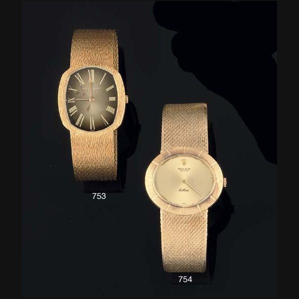 Rolex Rolex. An 18ct Gold Oval Cased Wristwatch on Associated 18ct Gold Bracelet SIGNED ROLEX, GENEVE, CELLINI, CASE NO 2439445, CIRCA 1980