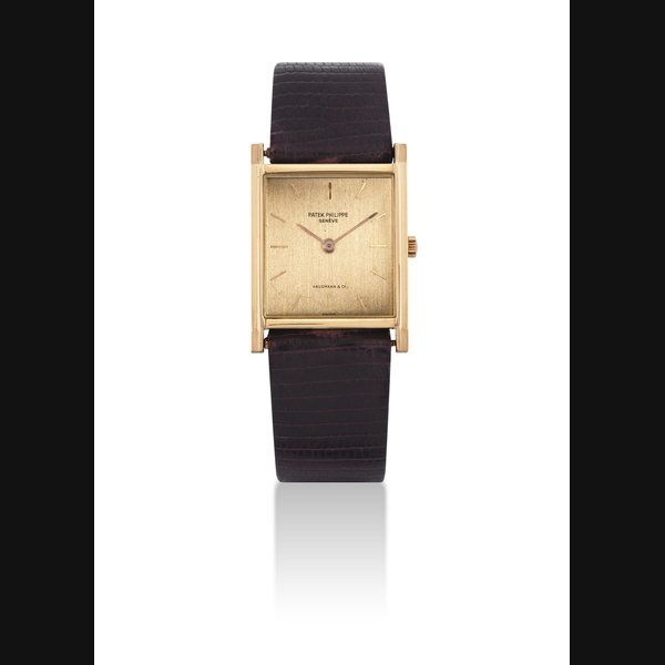 PATEK PHILIPPE. A FINE AND RARE 18K GOLD RECTANGULAR WRISTWATCH SIGNED PATEK PHILIPPE, GENEVE, RETAILED BY HAUSMANN & CO., REF. 3519, MOVEMENT NO. 1'155'265, CASE NO. 2'689'777, MANUFACTURED IN 1970