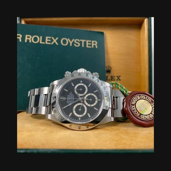 Rolex Rolex DaytonaUNPOLISHED Very Good Condition 1999 Daytona Black Dial 16520 Zenith Movement *RARE SERIAL*