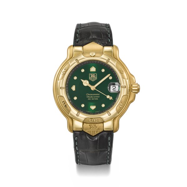 TAG HEUER. AN ATTRACTIVE 18K GOLD AUTOMATIC WRISTWATCH WITH SWEEP CENTRE SECONDS, DATE, GUARANTEE AND BOX SIGNED TAG HEUER, 6000 SERIES, NO. 1866, CIRCA 1995