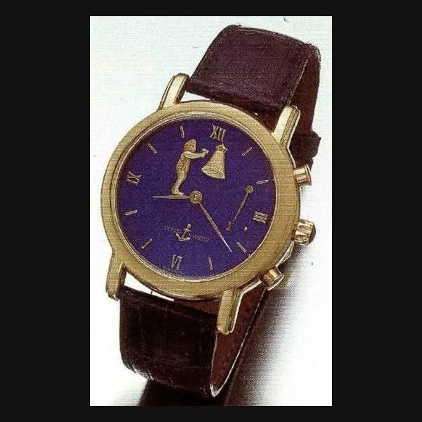 Ulysse Nardin Ulysse Nardin, Locle & Geneve, Chronometer San Marco, No. 11, Ref. 756-22, circa 1996. Important and rare, self-winding, minute repeating, water-resistant down to 30 meters,18K yellow gold gentleman's wrist clock-watch, with automaton striking hours and halves with blue leather strap and 18K yellow gold Ulysse Nardin buckle, fitted box and certificate. | Important Jewelry, Watches and Wristwatches | Hong Kong, Furama Hotel, 7th June 1999 · 756-22