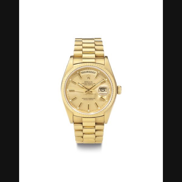 Rolex. An 18k Gold Automatic Wristwatch with Day, Date, Center Seconds and Bracelet SIGNED ROLEX, OYSTER PERPETUAL, DAY-DATE, REF. 18038, CASE NO. 6086341, CIRCA 1980